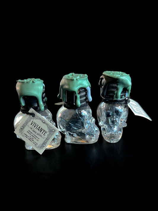 Vivianite Chips in Skull Jars